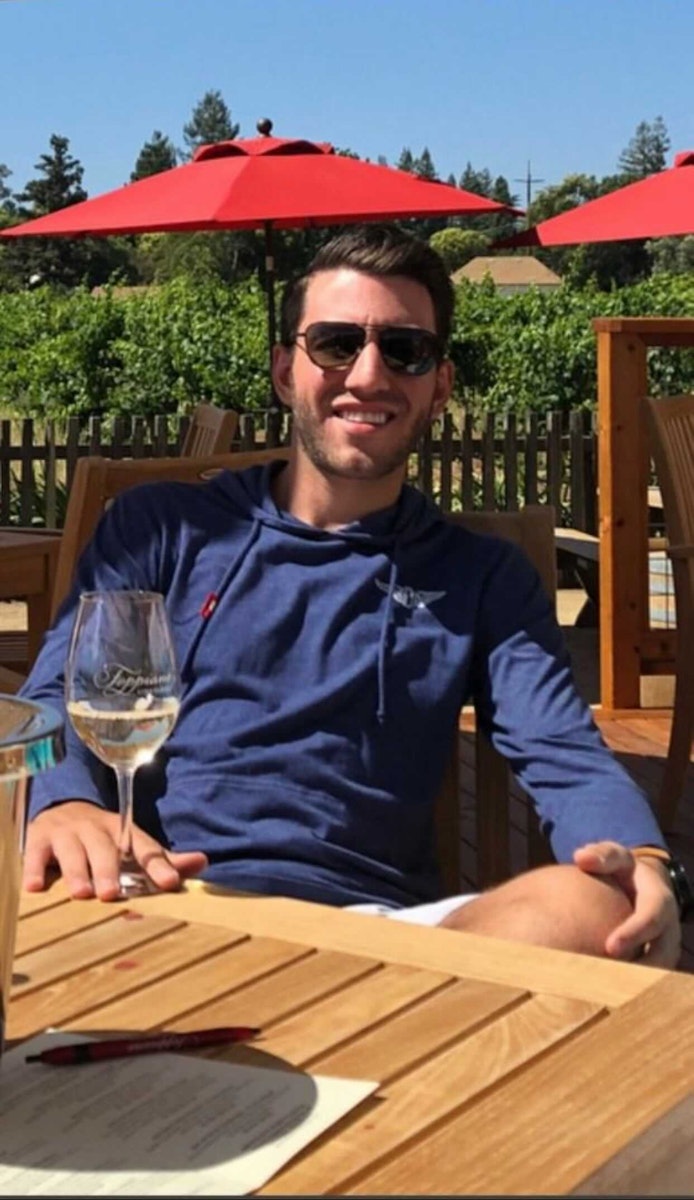 Mike enjoying a glass of wine outside